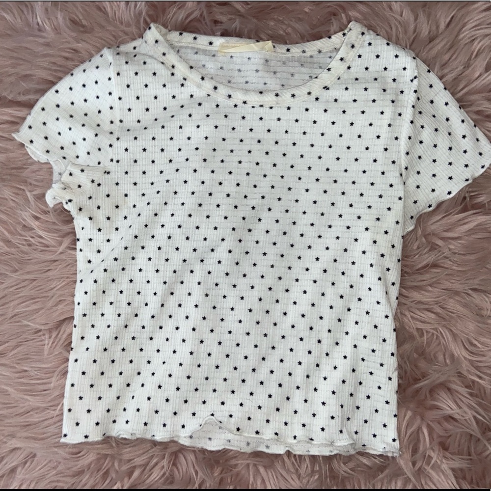 White shirt with stars.